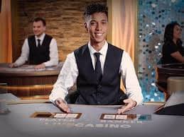Player placing a prediction choice on an Ikan Jackpot outcome category